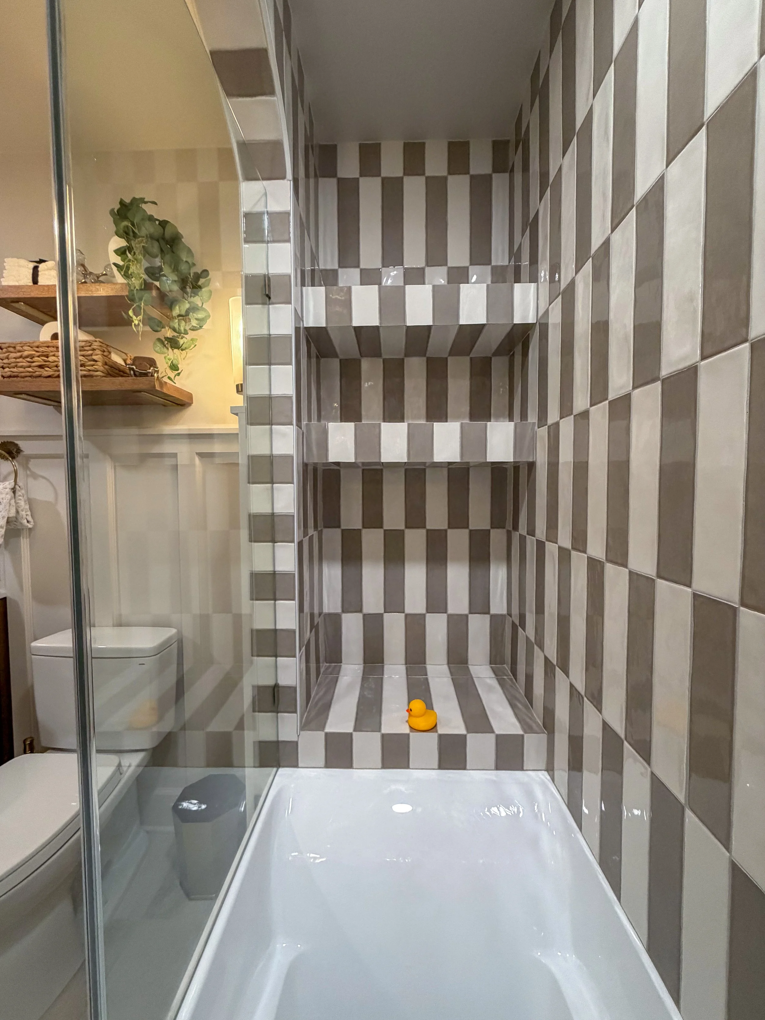kids bathroom renovation, modern traditional bathroom, transitional bathroom design, family bathroom remodel, bathroom tile design ideas, bathroom storage solutions, interior design bathroom, timeless bathroom design, durable bathroom, arched shower