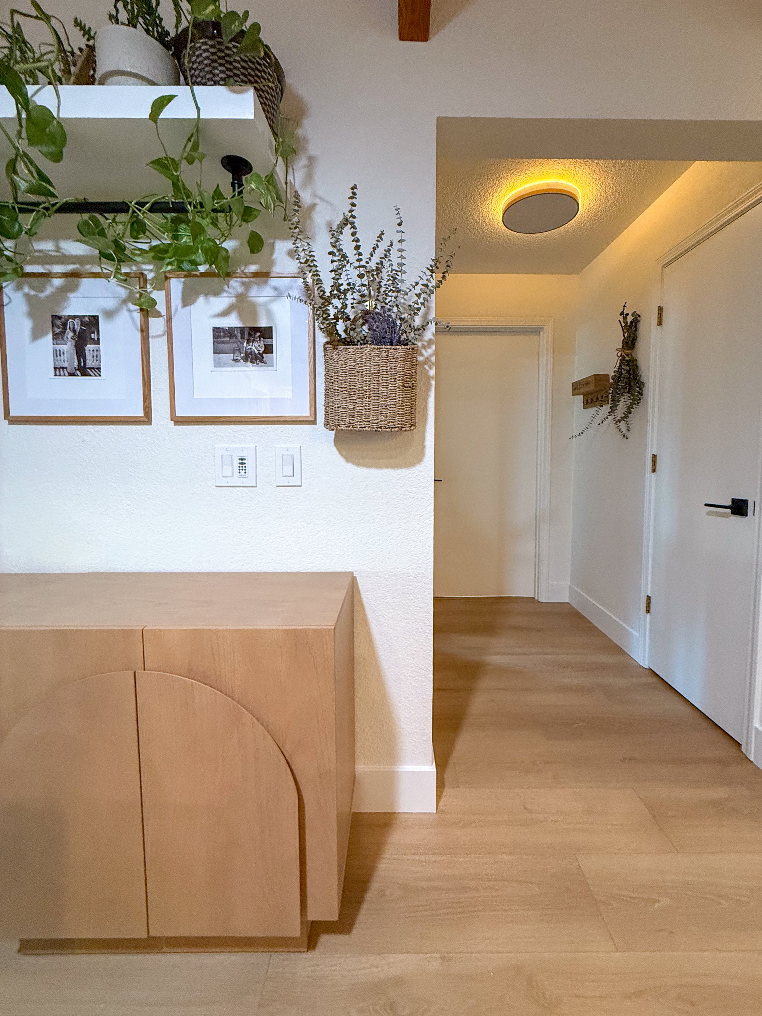 open concept home renovation, kitchen remodel, living room remodel, whole home renovation, light and airy interiors, vaulted wood ceilings, home refresh, custom built-ins, painted kitchen cabinets, interior renovation, pendant lighting