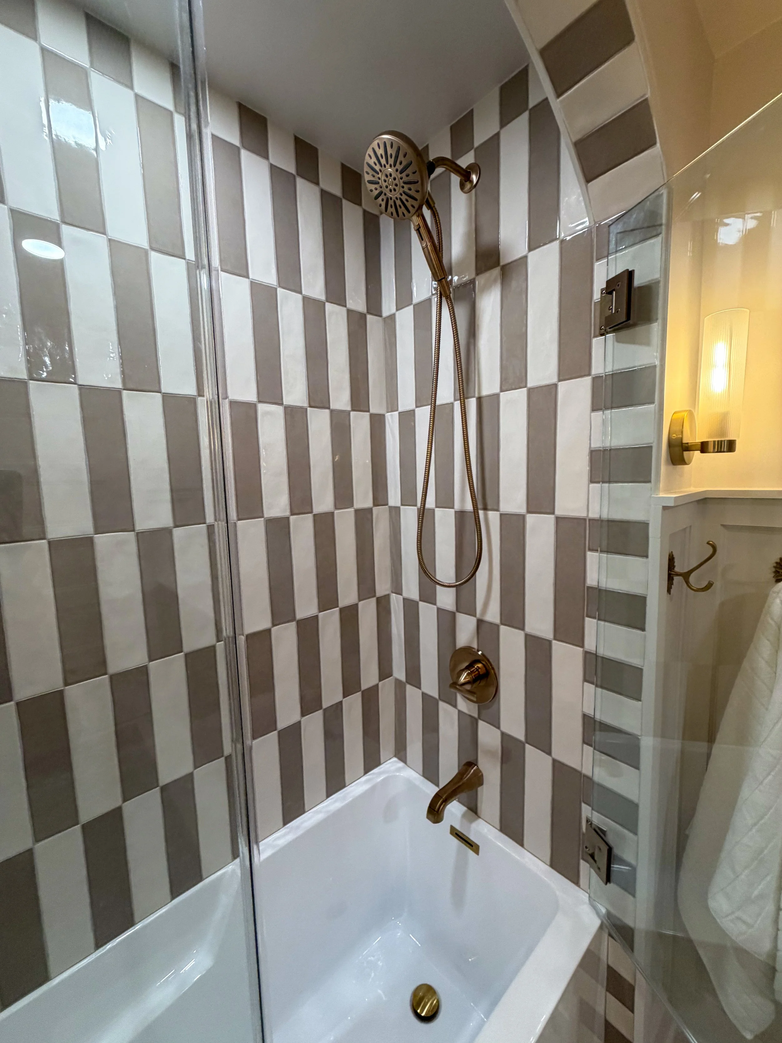 kids bathroom renovation, modern traditional bathroom, transitional bathroom design, family bathroom remodel, bathroom tile design ideas, bathroom storage solutions, interior design bathroom, timeless bathroom design, durable bathroom, arched shower