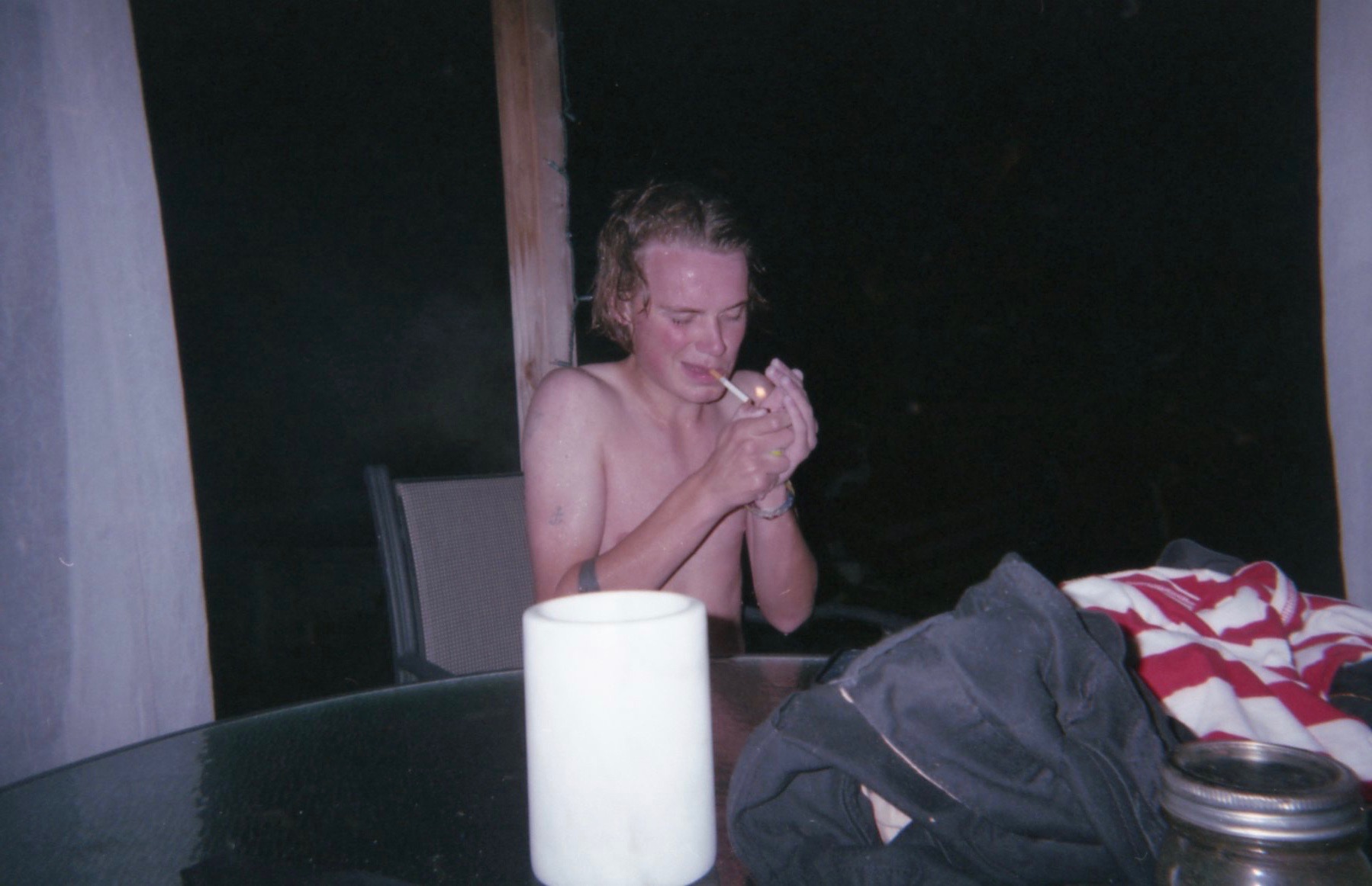 silas having a smoke. sometime summer. disposable.