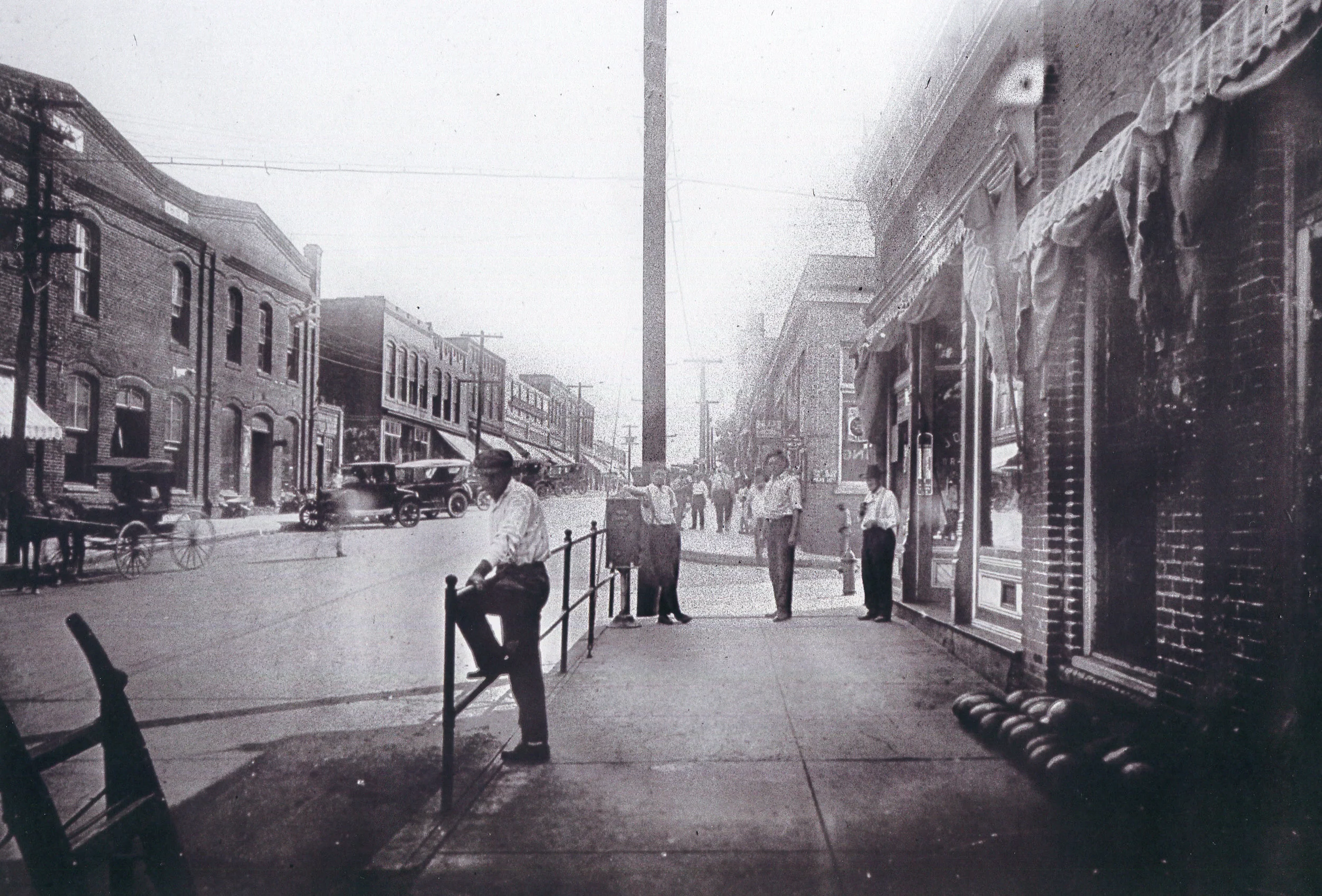 Men in front at peanut box