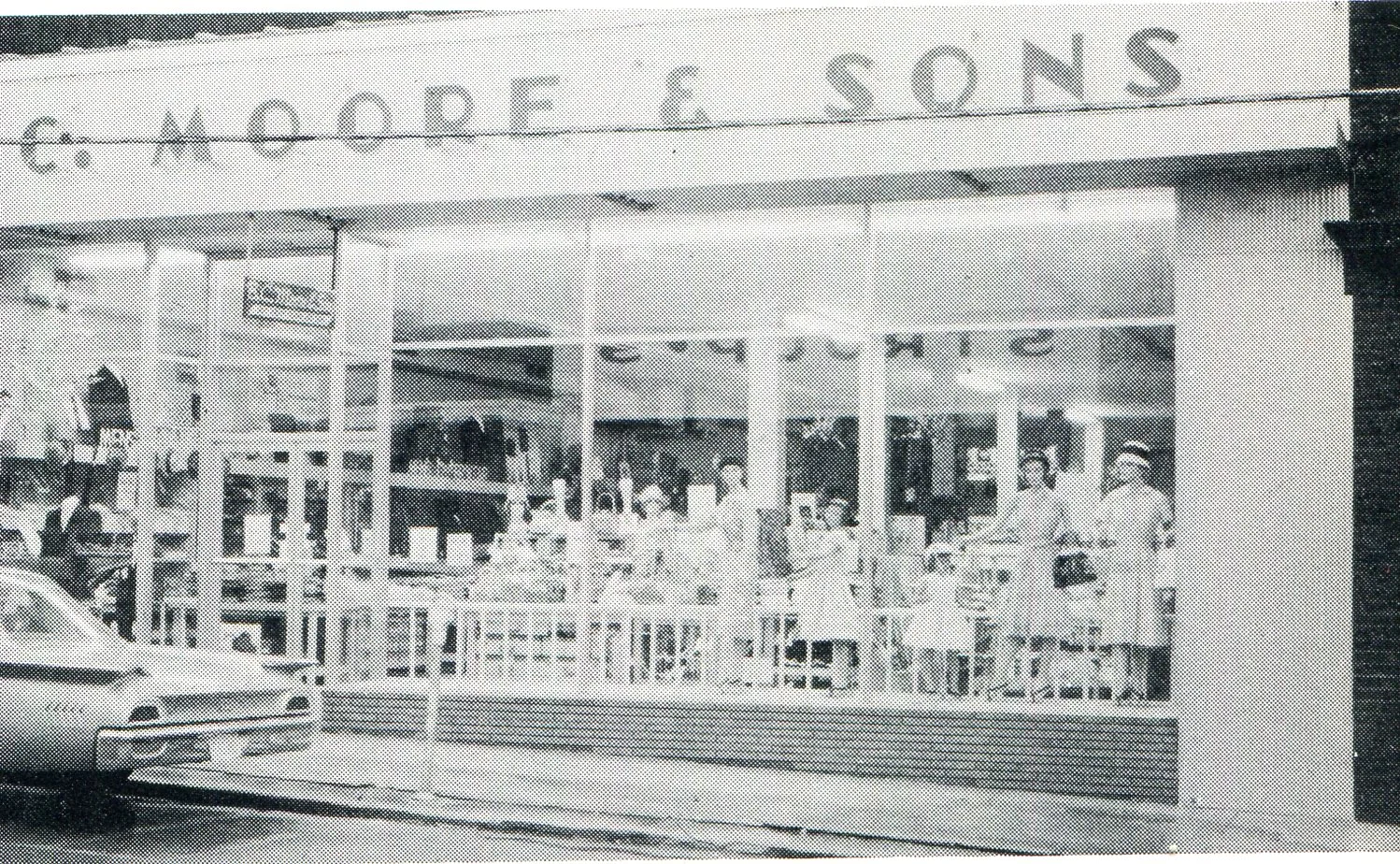 Moore's Clothing Store replaced the original building at this address