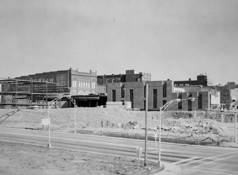 View of Dave Lyle Blvd., and the demolished areas, which once were, South and North Trade Streets. The last store remaining on the South side of Main on the west-side was that of the Rock Hill Hardware Company. Image taken in ca. 1970s. 