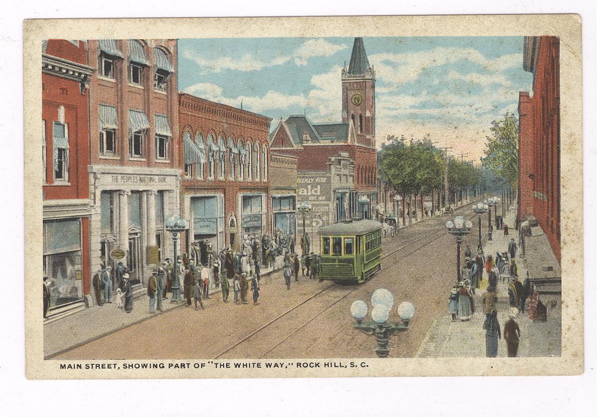 Note in this early 20th century postcard, St. John's Methodist Church's tower is clearly standing. In 1925 the church was demolished and the Citizens Bank was constructed on the corner location.