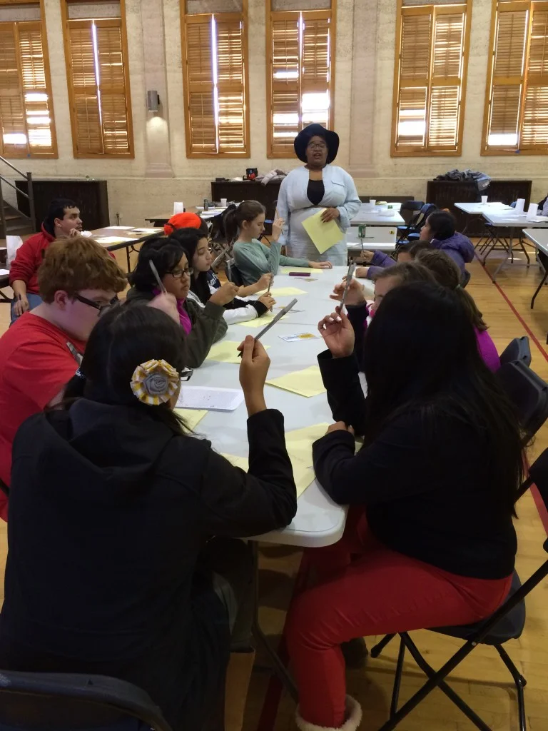 Black Rose teaching students at the McKinley Park MLK Day event