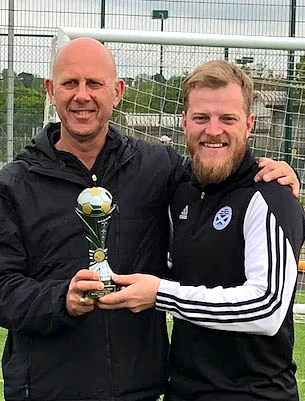 left David and Jason with the Trophy
