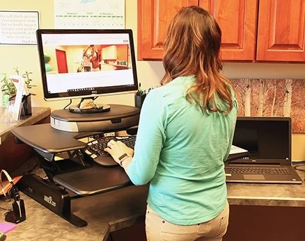 Many options exist for adjustable stand-up workstations.