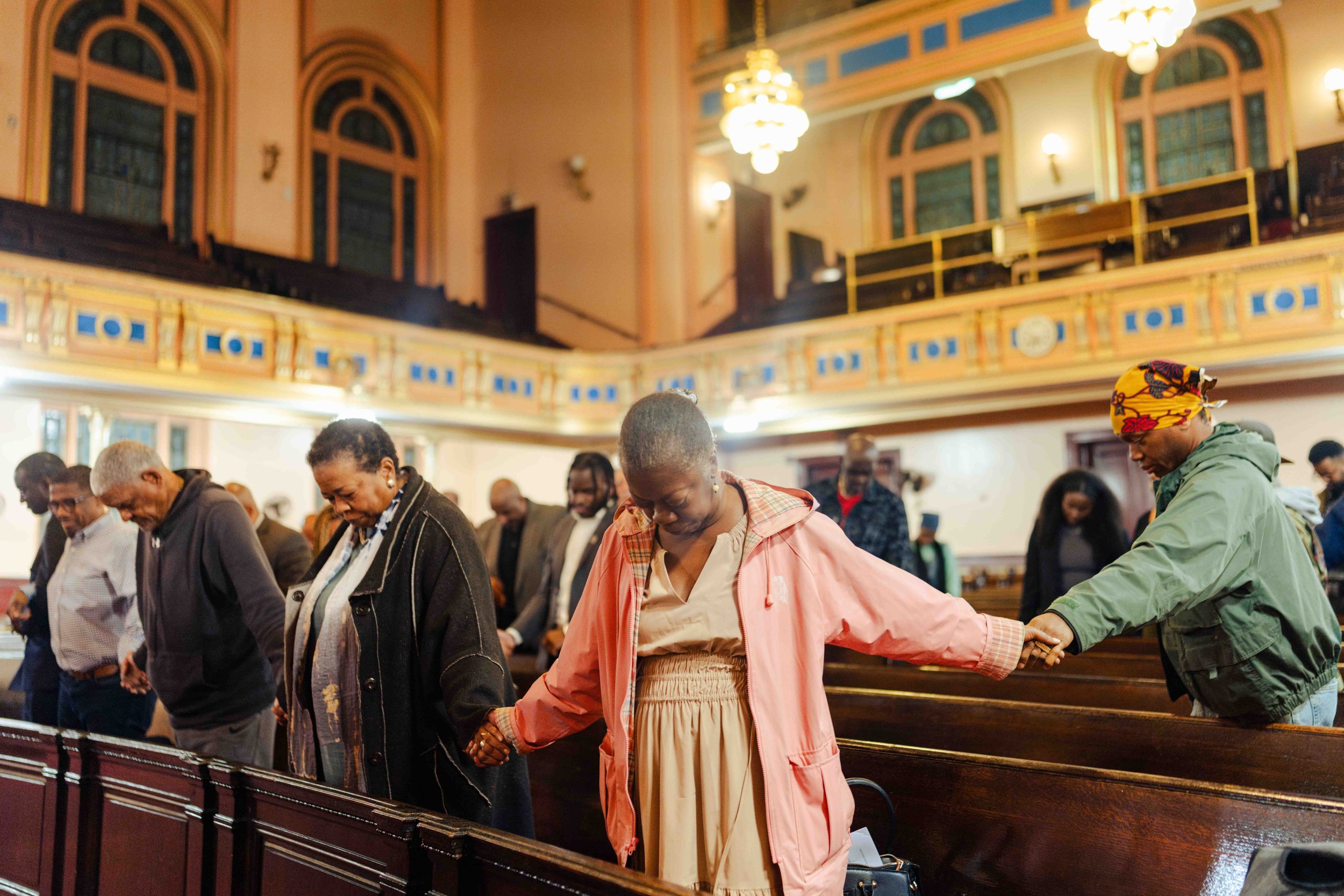 Harlem residents gather to combat harmful gentrification and displacement in their neighborhood. 