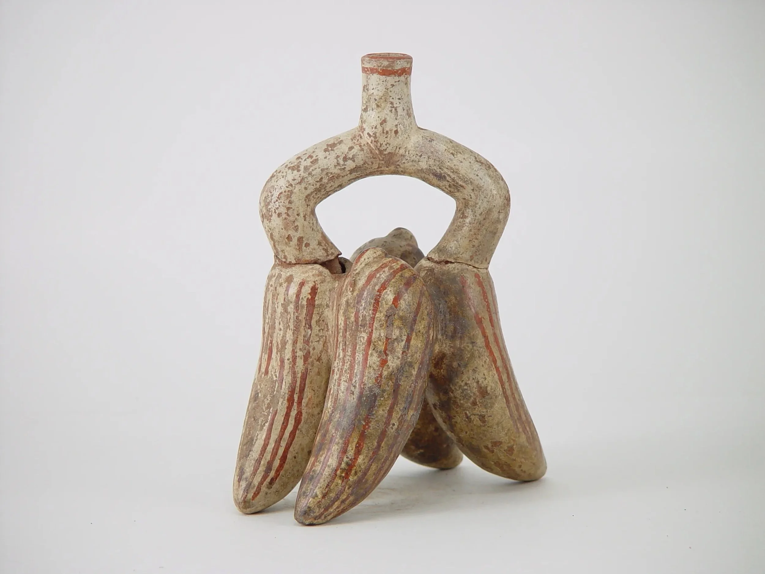Moche sculptural ceramic stirrup-spout bottle from the North Coast of Peru.