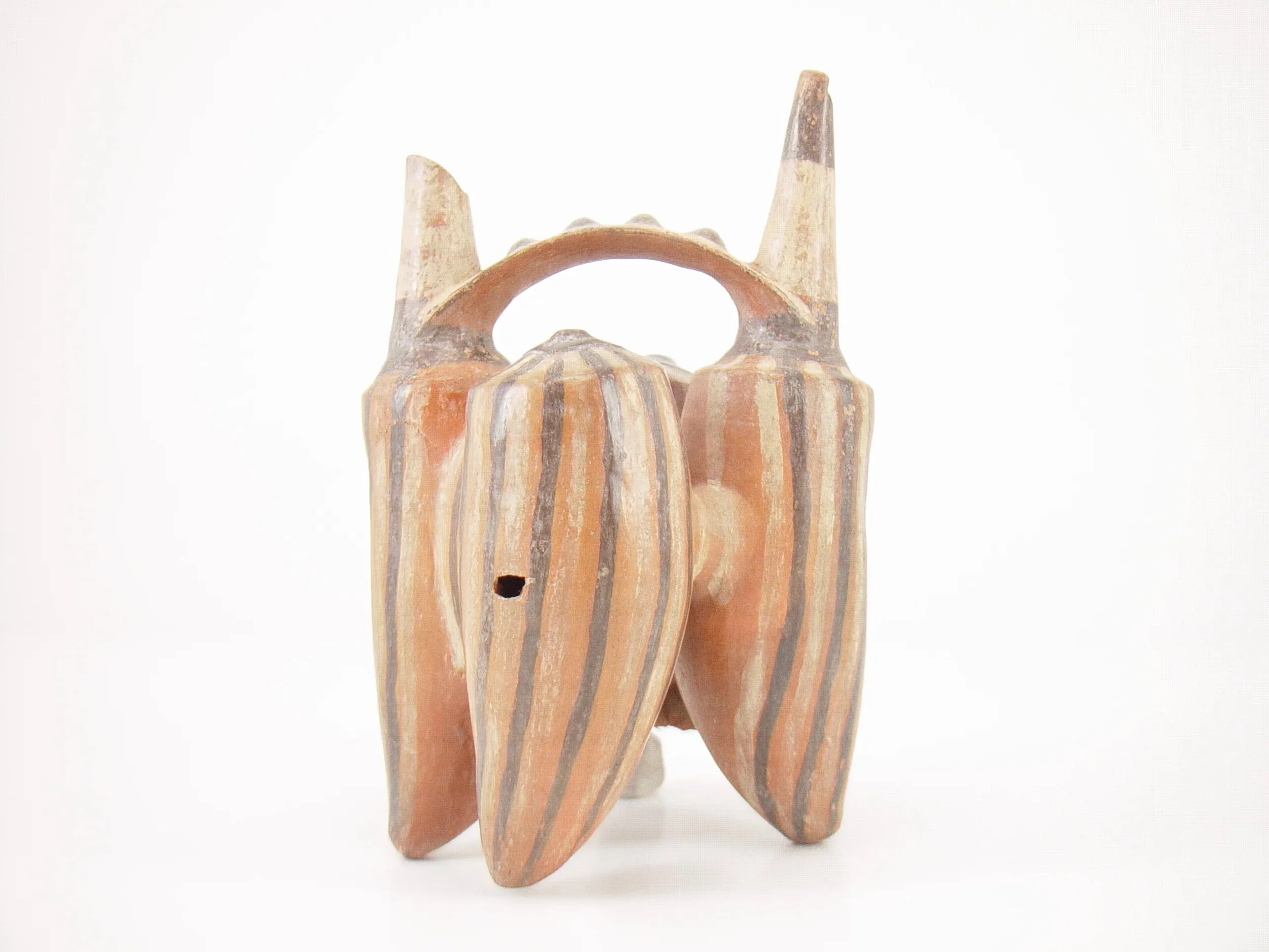 Northern Huari sculptural ceramic double-spout bridge-handle bottle from the North Coast of Peru.