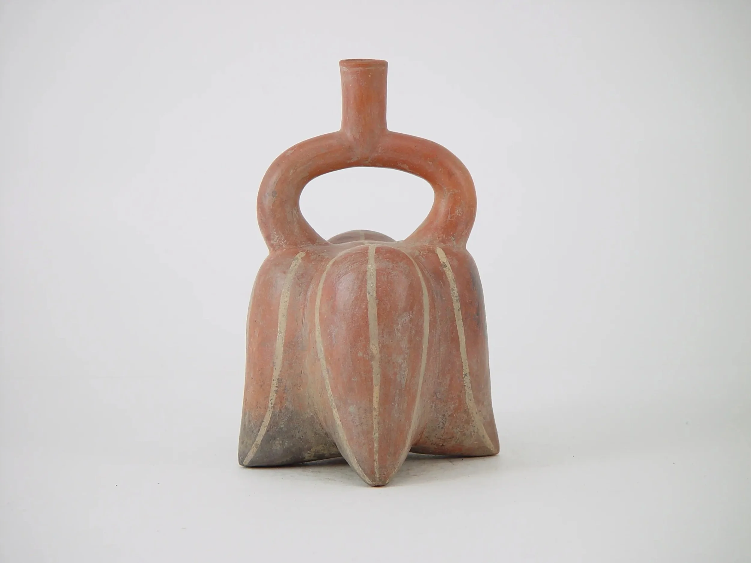 Moche sculptural ceramic stirrup-spout bottle from the North Coast of Peru.