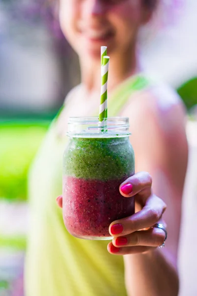43066593 - fitness girl with colorful smoothie