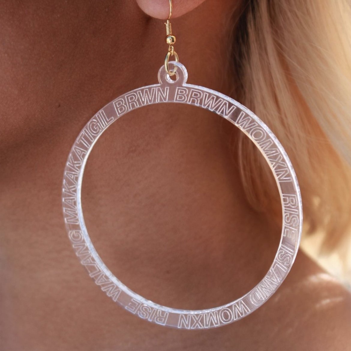  These earrings were made in collaboration with Bay Area rapper Ruby Ibarra. The Tagalog words  walang makakatigil  translates to “nothing can stop [us].”  