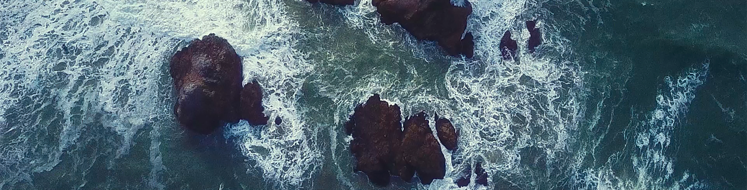 Ocean rocks, stormy.png