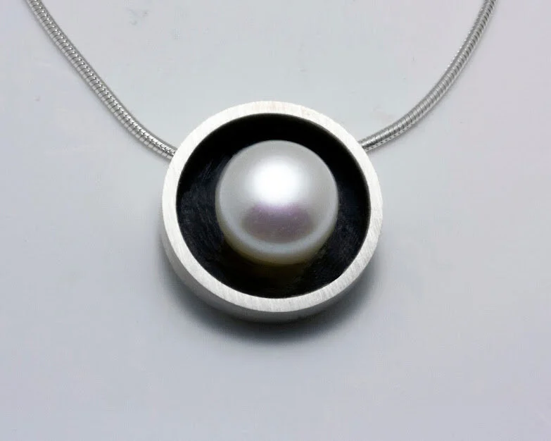 Modernist Deep Set Pearl Necklace