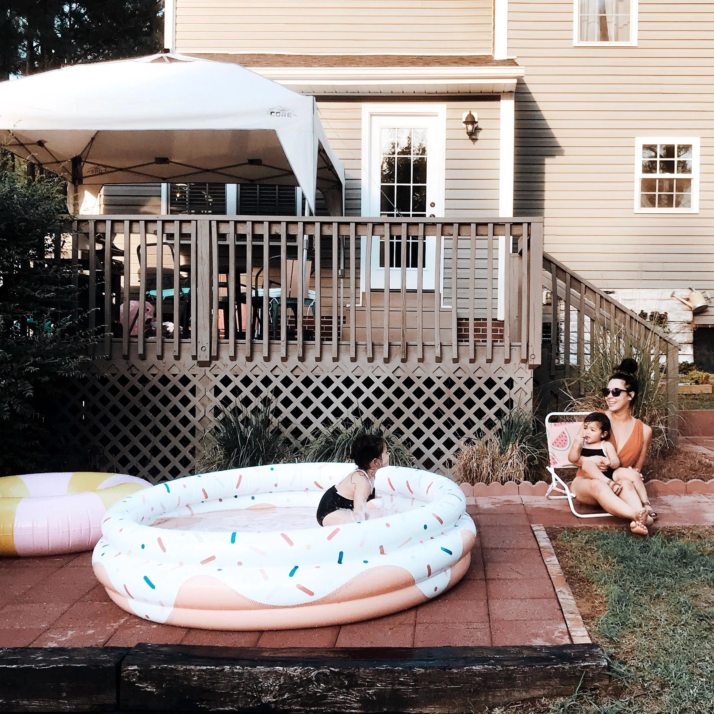 donut pool and canopy tent shown here