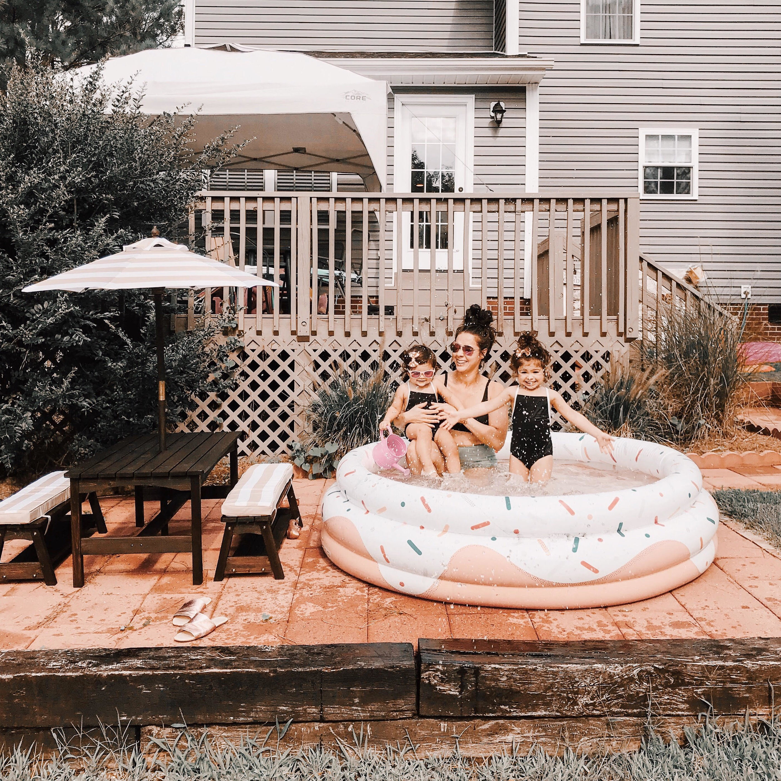 kids picnic table with the donut pool and canopy tent