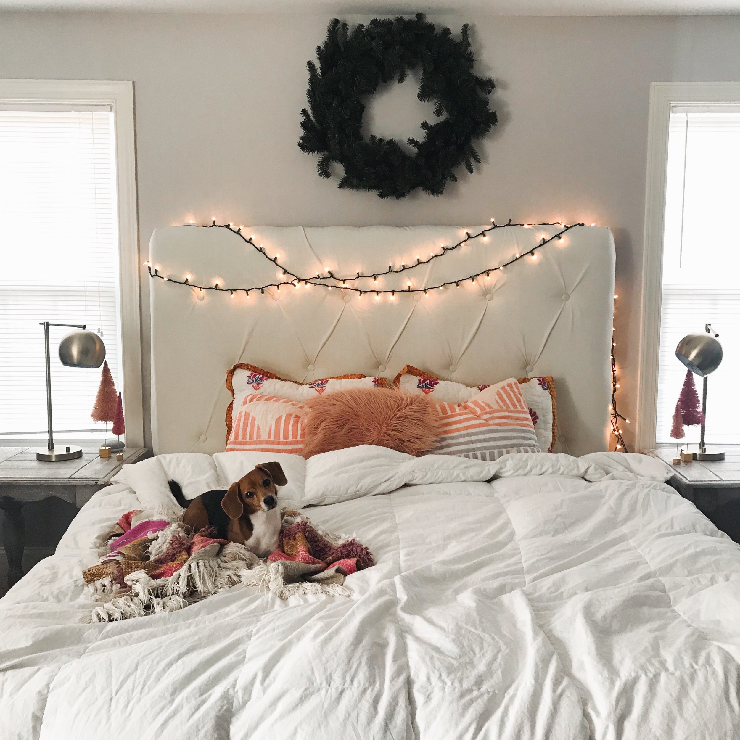 And there ya have it. A look around our home. This is our bedroom and just adding a simple wreath and twinkle lights completely transformed this area into my dreamland. Night night!