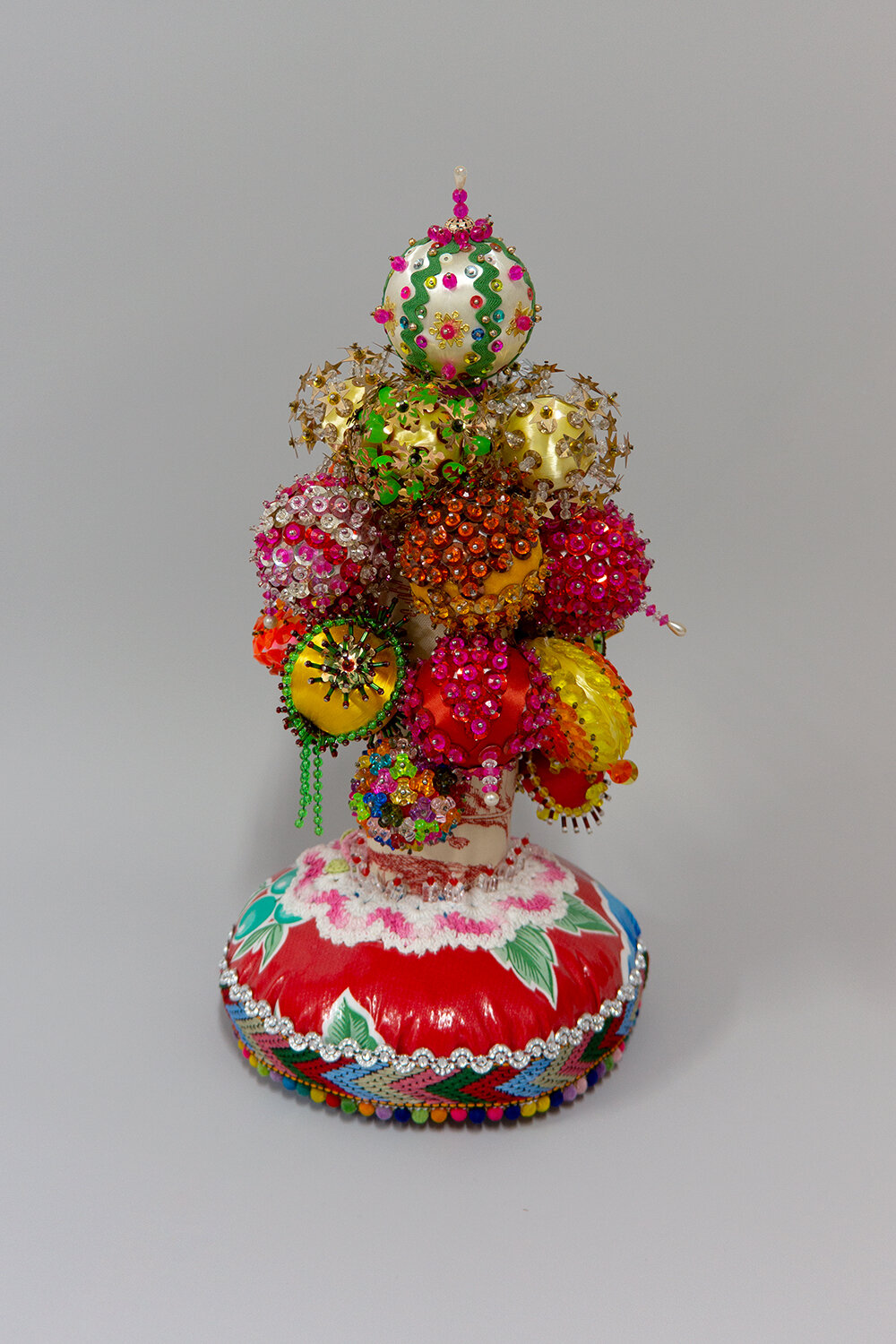   Grandstand , 2019, Crystal and plastic beads, found fabric, trim, ornaments, polyester batting, thread, 14.5 x 8 x 8” 