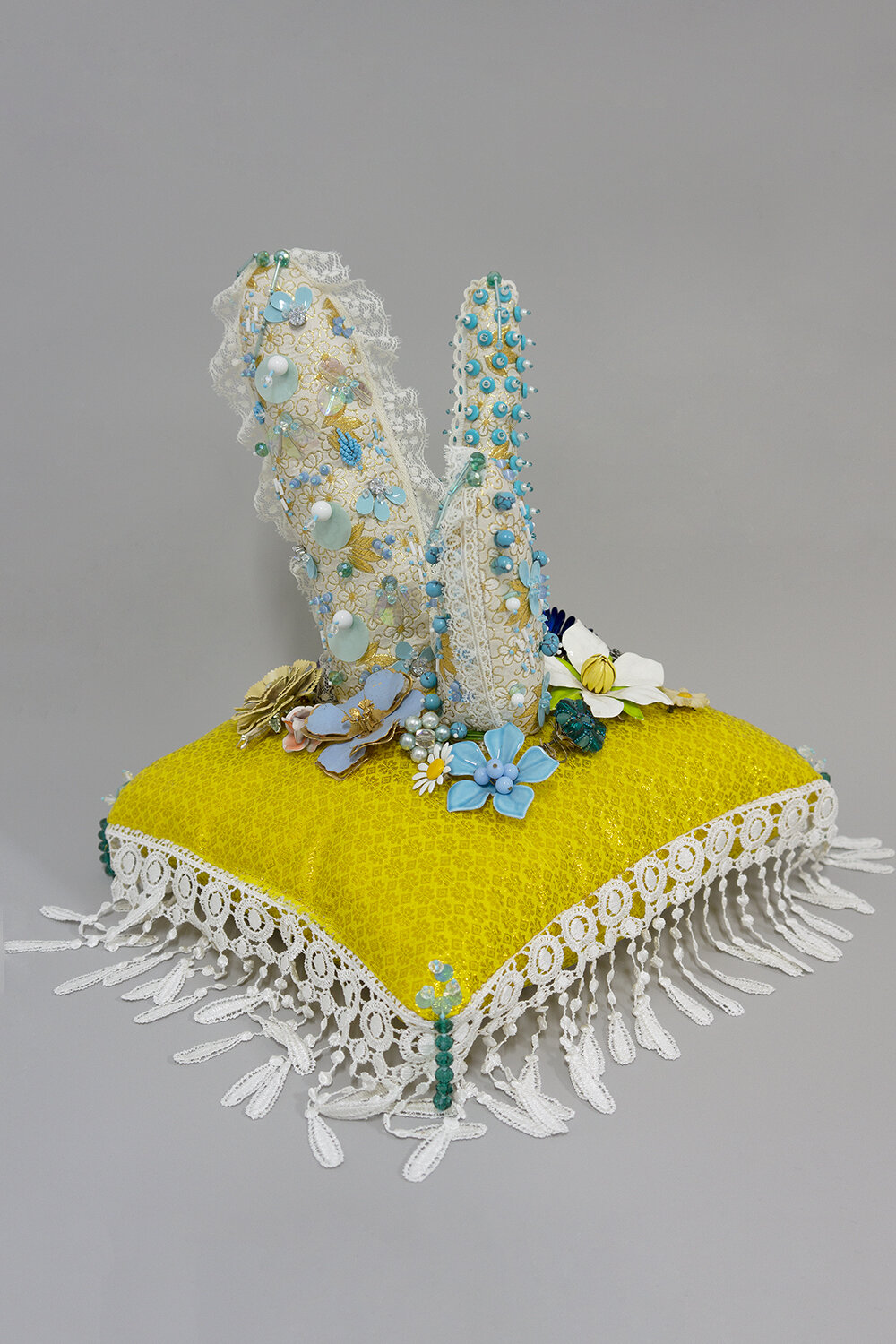   Privilege , 2018, Crystal and plastic beads, sequins, found fabric, trim, costume jewelry, polyester batting, thread, 15 x 11.5 x 11.5” 