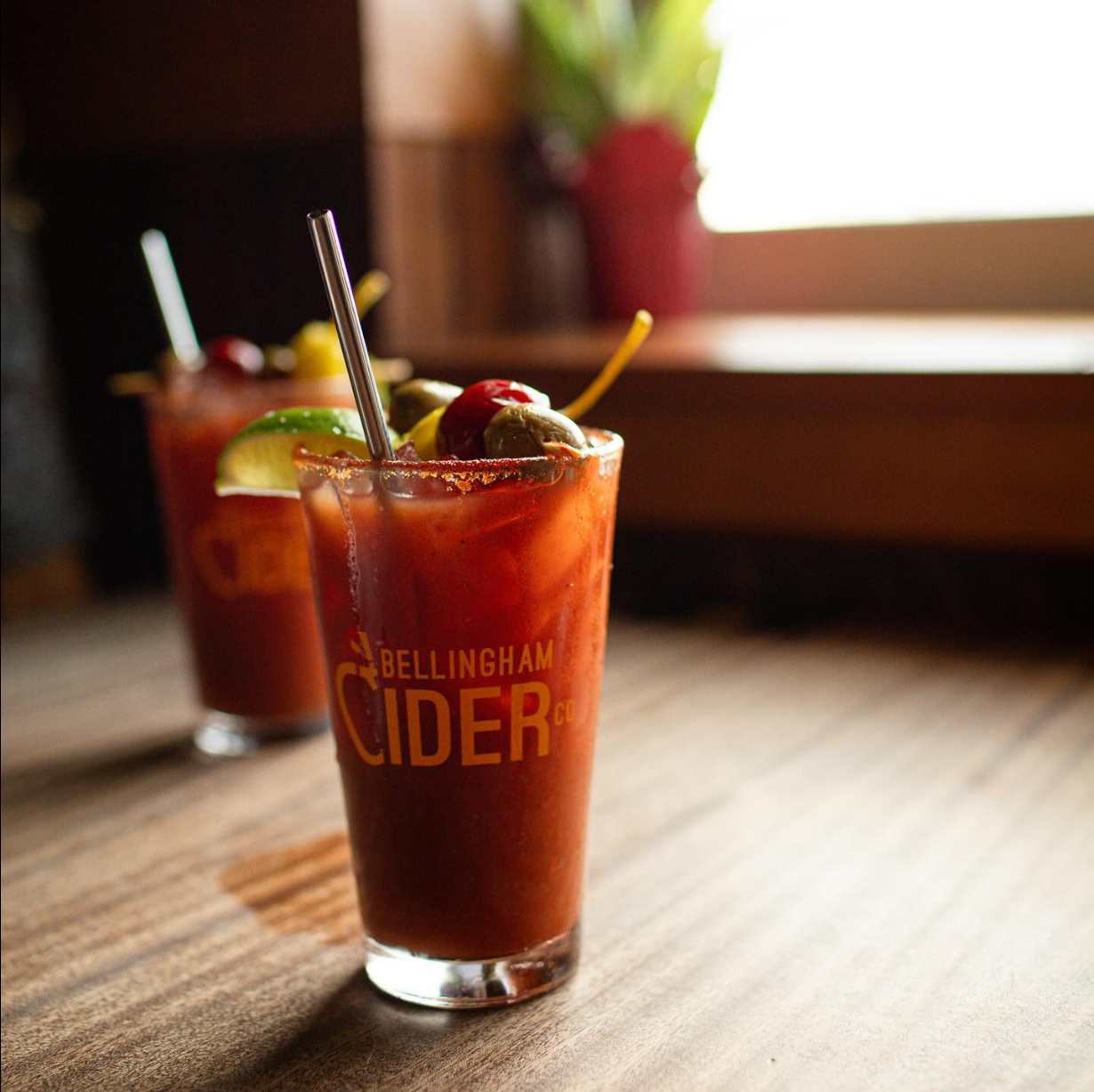 Two blood marys on a restaurant table