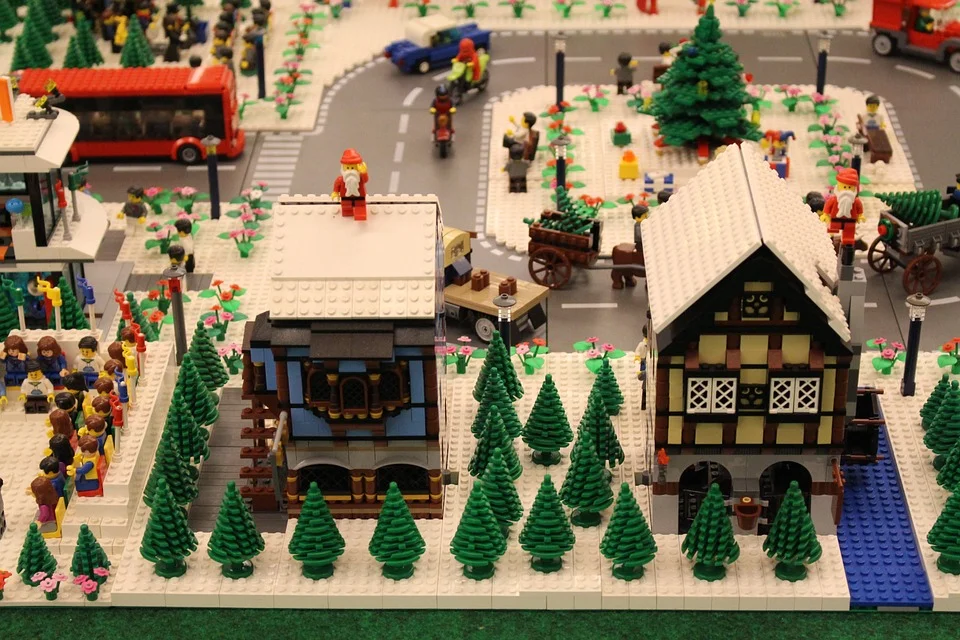 Tight and loose coupling brings different properties to your system (fast and rich vs. reliable and cheap). In most real applications you need a mix of both tightly and loosely coupled parts, like this Lego town. Anyone can see that replacing one house won't affect the other, or the bus in the background. They are loosely coupled. Within each house the bricks are more tightly coupled, but you can still take them apart and add a floor relatively easy.