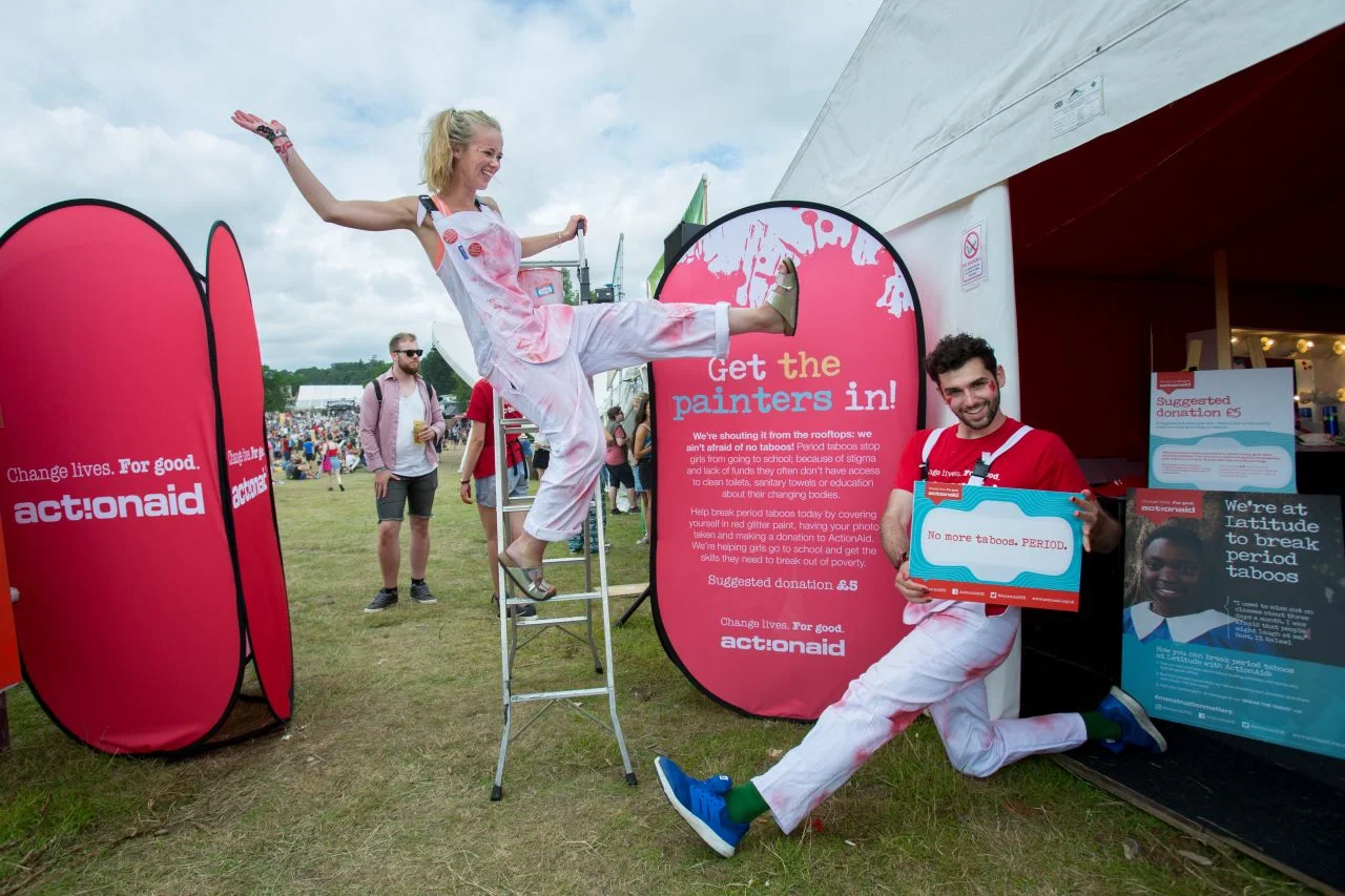  Quirky signs encourage festival-goers to…get the painters in! Volunteers adorned visitors with red glitter, love hearts and feather boas before snapping a social-media-worthy pic in the vintage booth. 