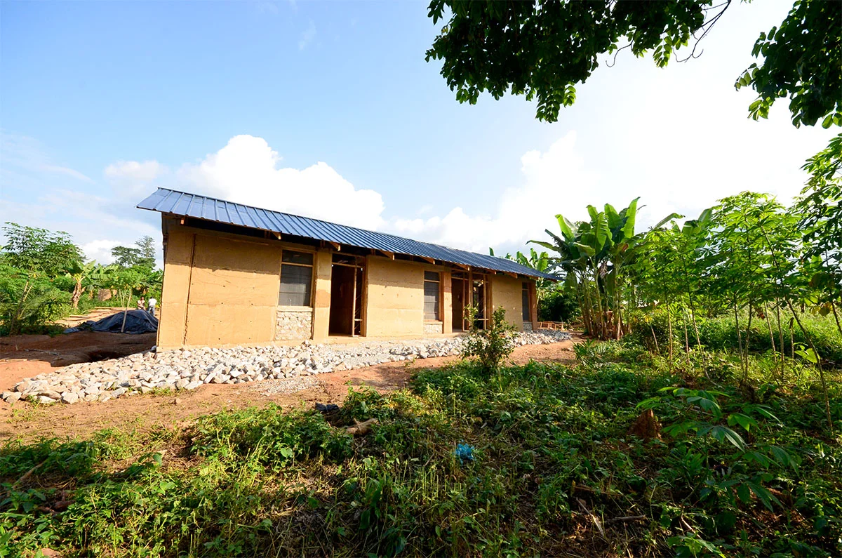 Rear elevation of building from the forest. Photo by Kohei Takegawa