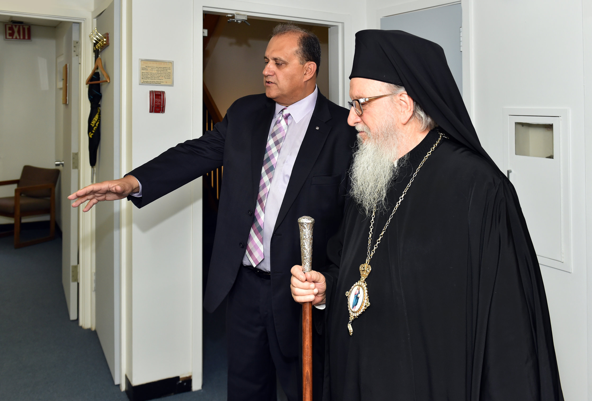  Nick Larigakis provides a tour of the Hellenic House to His Eminence Archbishop Demetrios of America. 