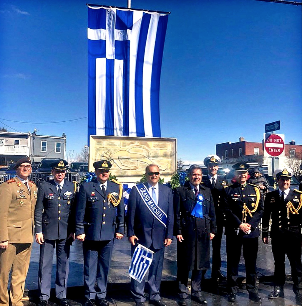 Nick Larigakis with Greek Ambassador to the U.S. Haris Lalacos (center) along with Greek military attaches of the Embassy of Greece in front of a representation of the Greek tomb of the unknown soldier
