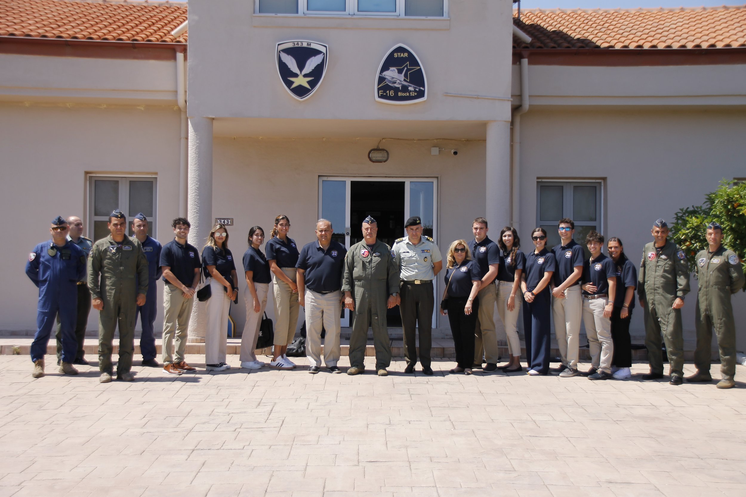  Students visiting and receiving a briefing by the Commander, Colonel (AF) Christos Grigoroudis at 115 CW (Combat Wing) in Souda Bay. 