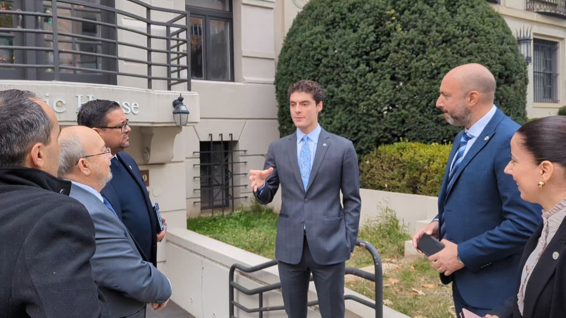  AHI Executive Director Zac Cotronakis having a discussion with the delegation outside of the Hellenic House. 