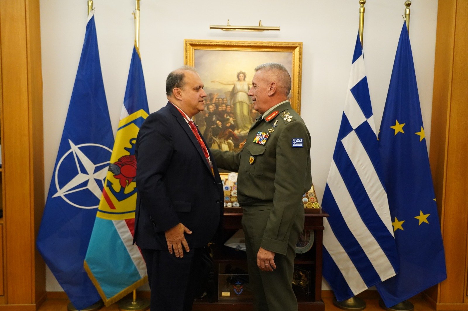  Chief of the Hellenic National Defence General Staff General Konstantinos Floros greeting AHI President Larigakis. 