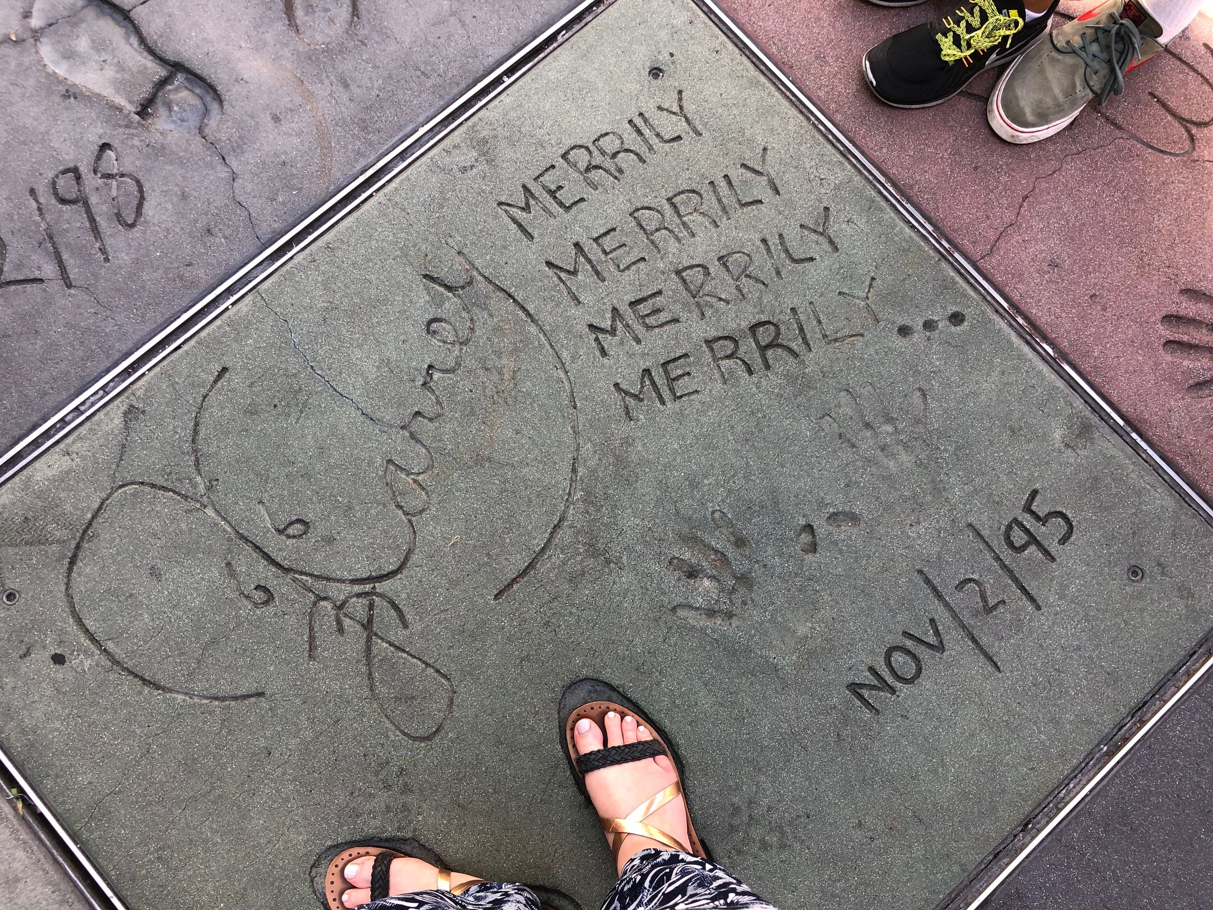 Jim Carrey’s prints at Grauman’s Chinese Theatre in Los Angeles, CA (and my feet)