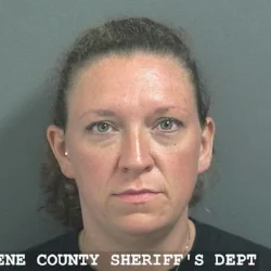 Solsberry woman accused of taking a child with her to pour sugar in another woman’s gas tank