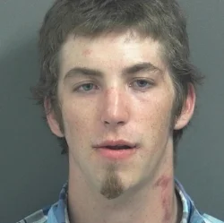 Weekend shooting suspect was packing a bag when LPD officer showed up. Bond set at $100,000