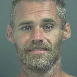 Bicyclist screaming cops were after him, attracts attention of cops