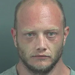 First accused of intimidation, now accused of violating a protective order
