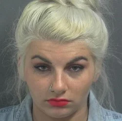 Bloomfield woman arrested, accused of threat to slit someone’s throat