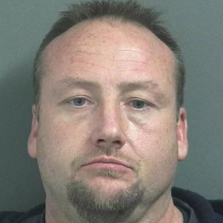 Man accused of sending threats via cell phone while parked outside home of ex-girlfriend