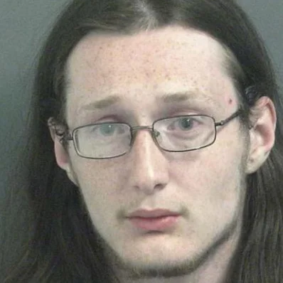 Switz City man accused of shoving and spitting on family member