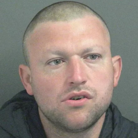 Inmate accused of spitting in the faces of two jail officers