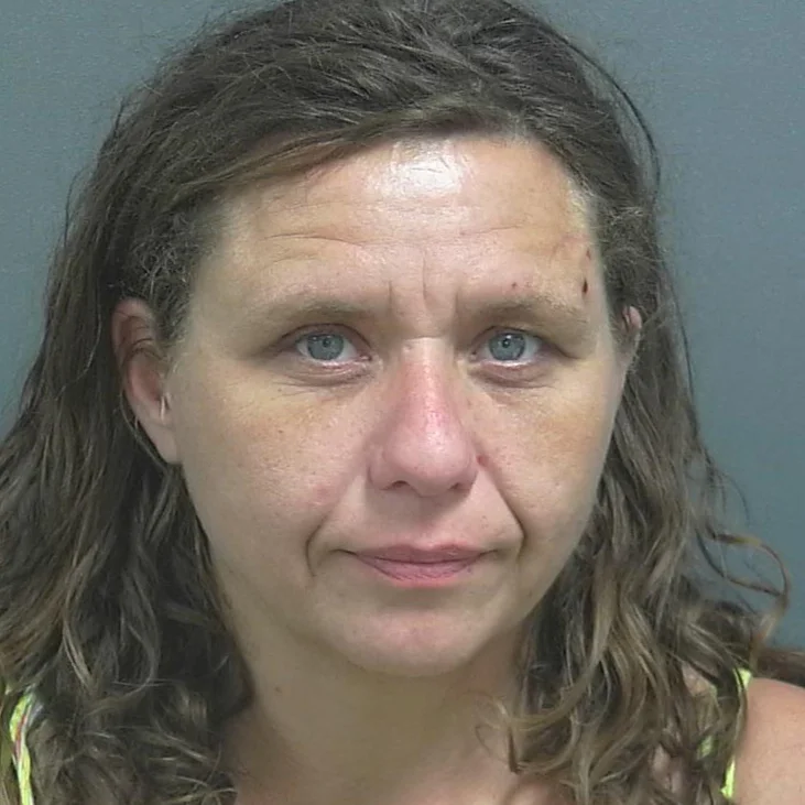 Failure to dim headlights then failure to signal a turn leads to traffic stop then drug charges
