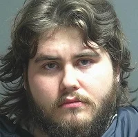 Man found lying on the sidewalk winds up in jail