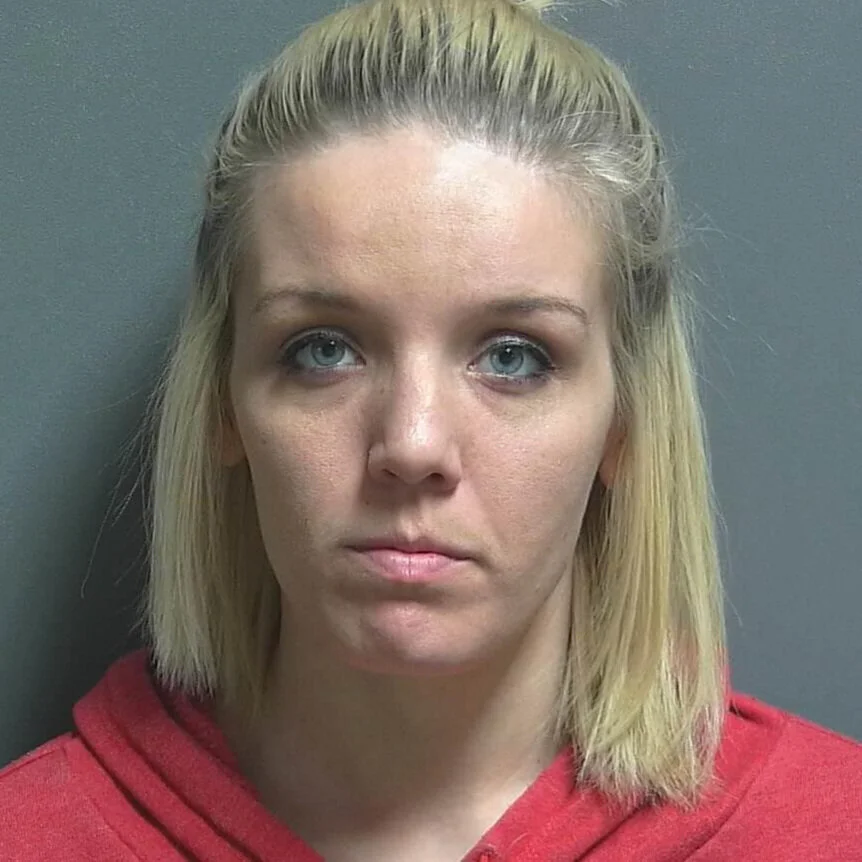 Woman accused of trying to con the county auditor