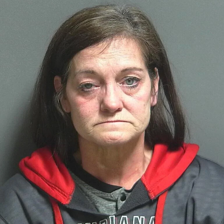 UPDATE on Case: Driver found slumped over behind the wheel is charged with dealing heroin