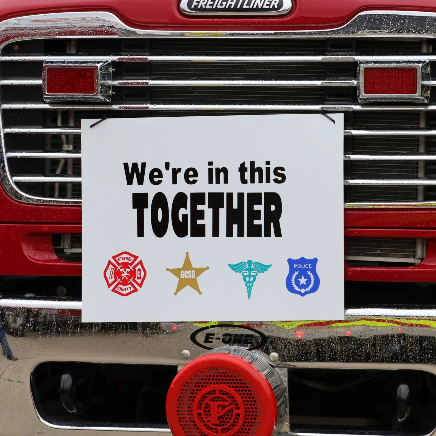 Officers, firefighters and rescue personnel thank health care workers with parade