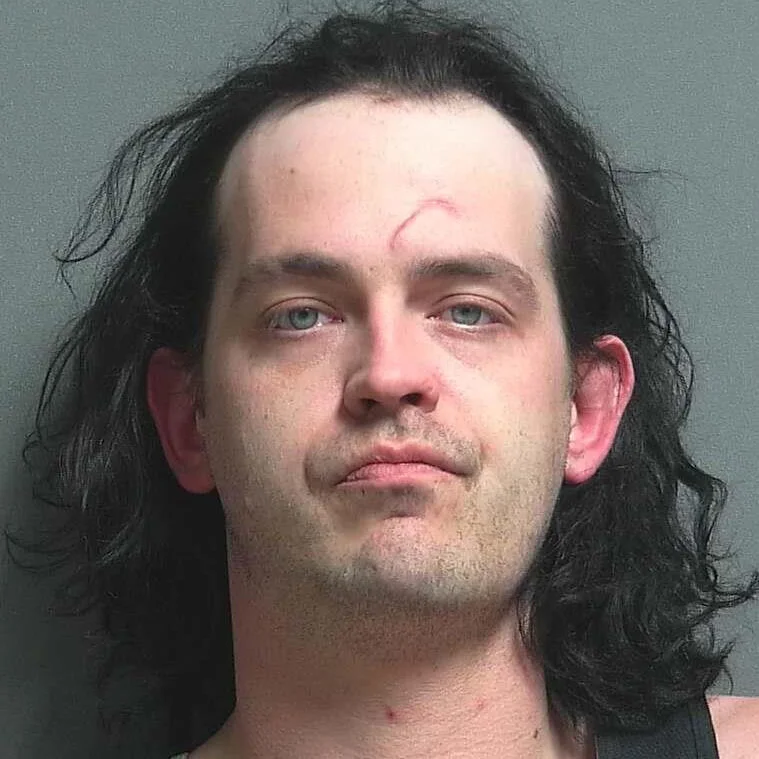 Driving with a plate that expired in 2015 results in a traffic stop