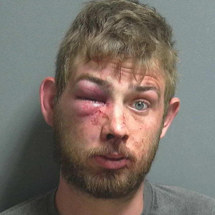 Man punched in the face after allegedly swinging a tire tool