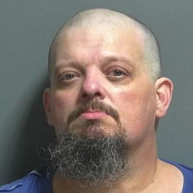 Driver arrested after crashing car